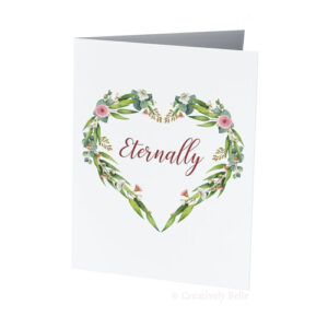 A floral heart made of Australian gum blossoms and leaves with the word Eternally inside it