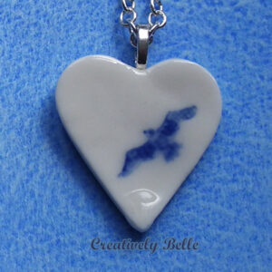 Blue and White heart albatross necklace